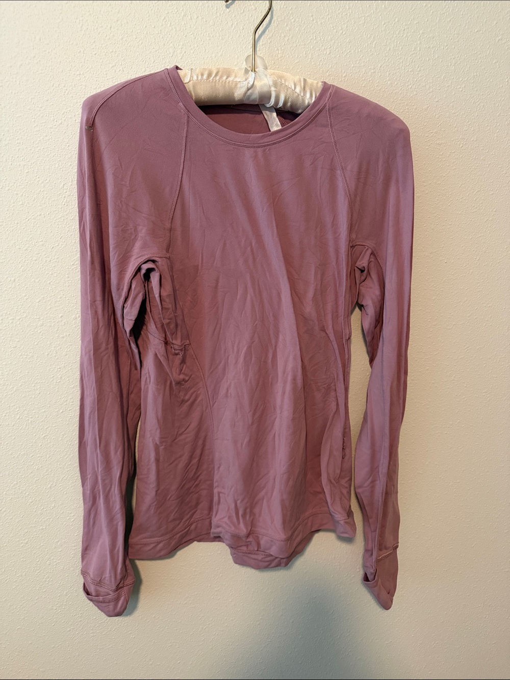 Lululemon Women's Long-Sleeve Scoop Neck Top with thumbholes and pockets - Mauve